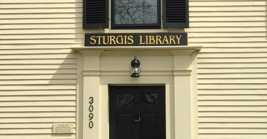 The door to Sturgis Library with sign above